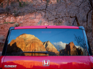 1124-LasVegas-0057 Zion National Park reflected in the window of a Honda Element